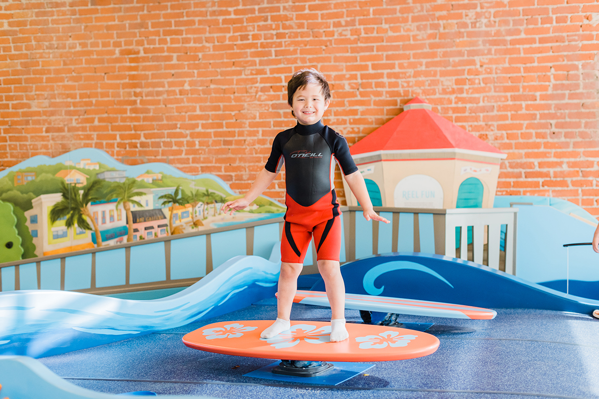 child play surfing