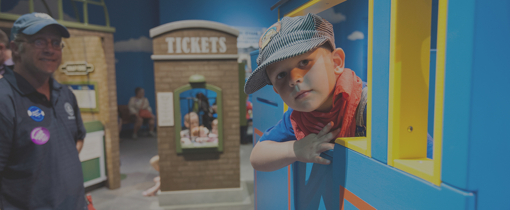 kids playing on Thomas the Train exhibit